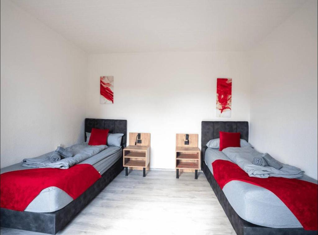 Schlafzimmer 1 mit Einzelbetten