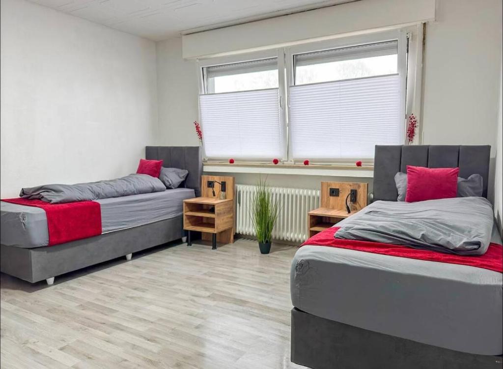 Schlafzimmer 1 mit 3 Einzelbetten
