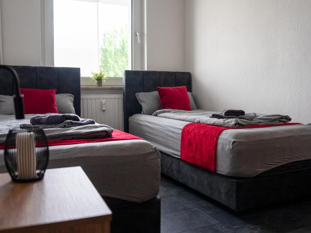 Schlafzimmer 1 mit Einzelbetten