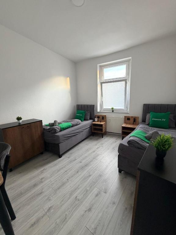 Schlafzimmer 2 mit 2 Einzelbetten im Apartment 1 Oberhausen