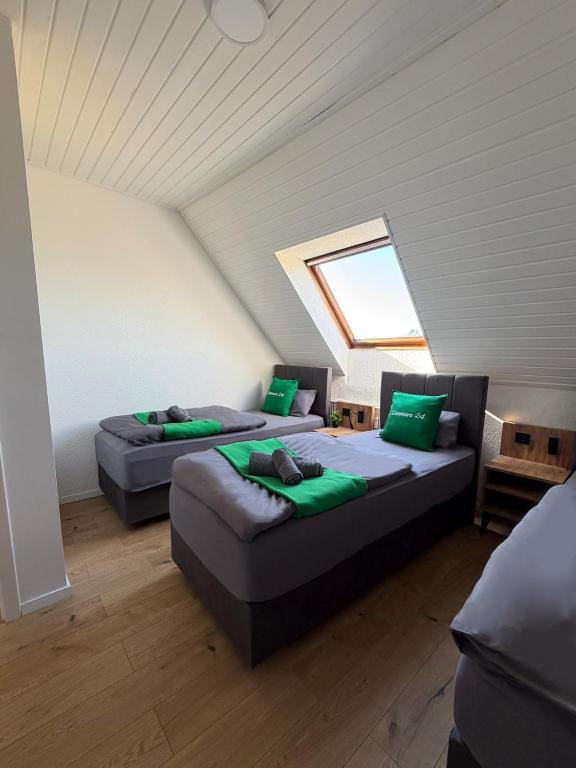 Schlafzimmer 2 mit Einzelbett, Apartment 3 Oberhausen
