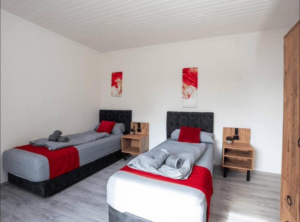 Weiteres Schlafzimmer mit 2 Einzelbetten im Apartment 5 Recklinghausen Hochlarmark
