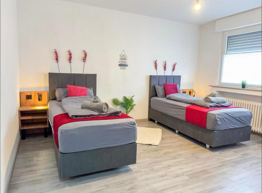 Schlafzimmer 2 mit 2 Einzelbetten im Apartment 1 Gladbeck
