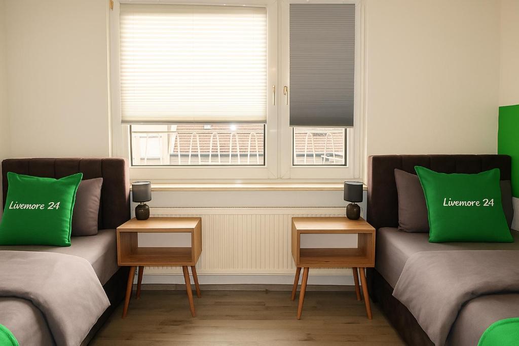 Schlafzimmer 2 mit 2 Einzelbetten im Apartment 2 Duisburg Marxloh