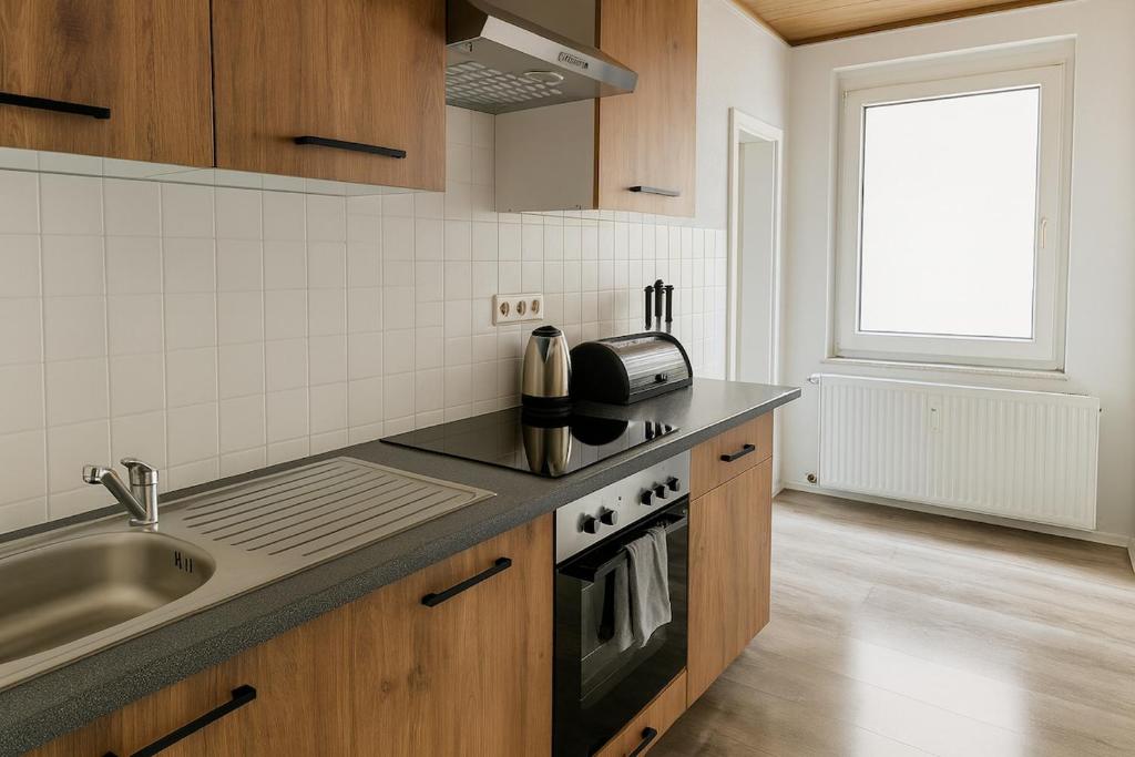 Voll ausgestattete Küche im Apartment 3 Herten
