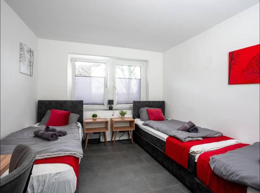 Schlafzimmer 2 mit Einzelbetten in der Space in Oer-Erkenschwick