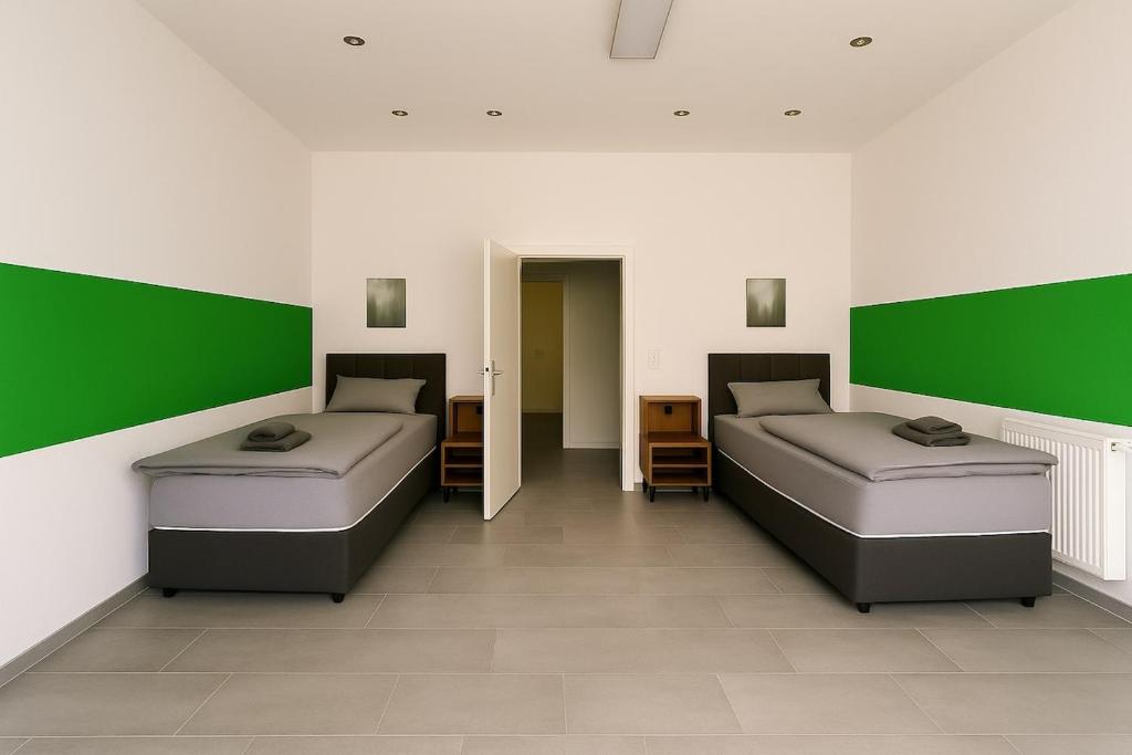 Weiteres Schlafzimmer mit Einzelbetten im Space Herten Mitte